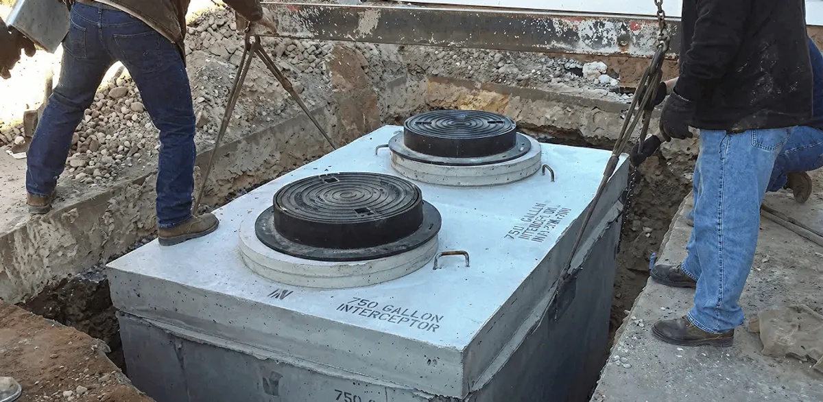Grease trap installation for a commercial property drainage system in Houston, TX