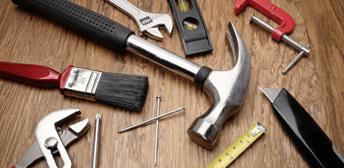 Handyman tools laid out for home repair and maintenance work in Houston, TX